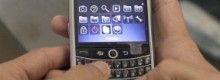 Geloso del Blackberry frusta moglie